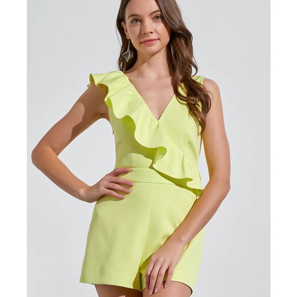 Shorts romper with ruffle sleeve in neon lemon yellow size small NWOT